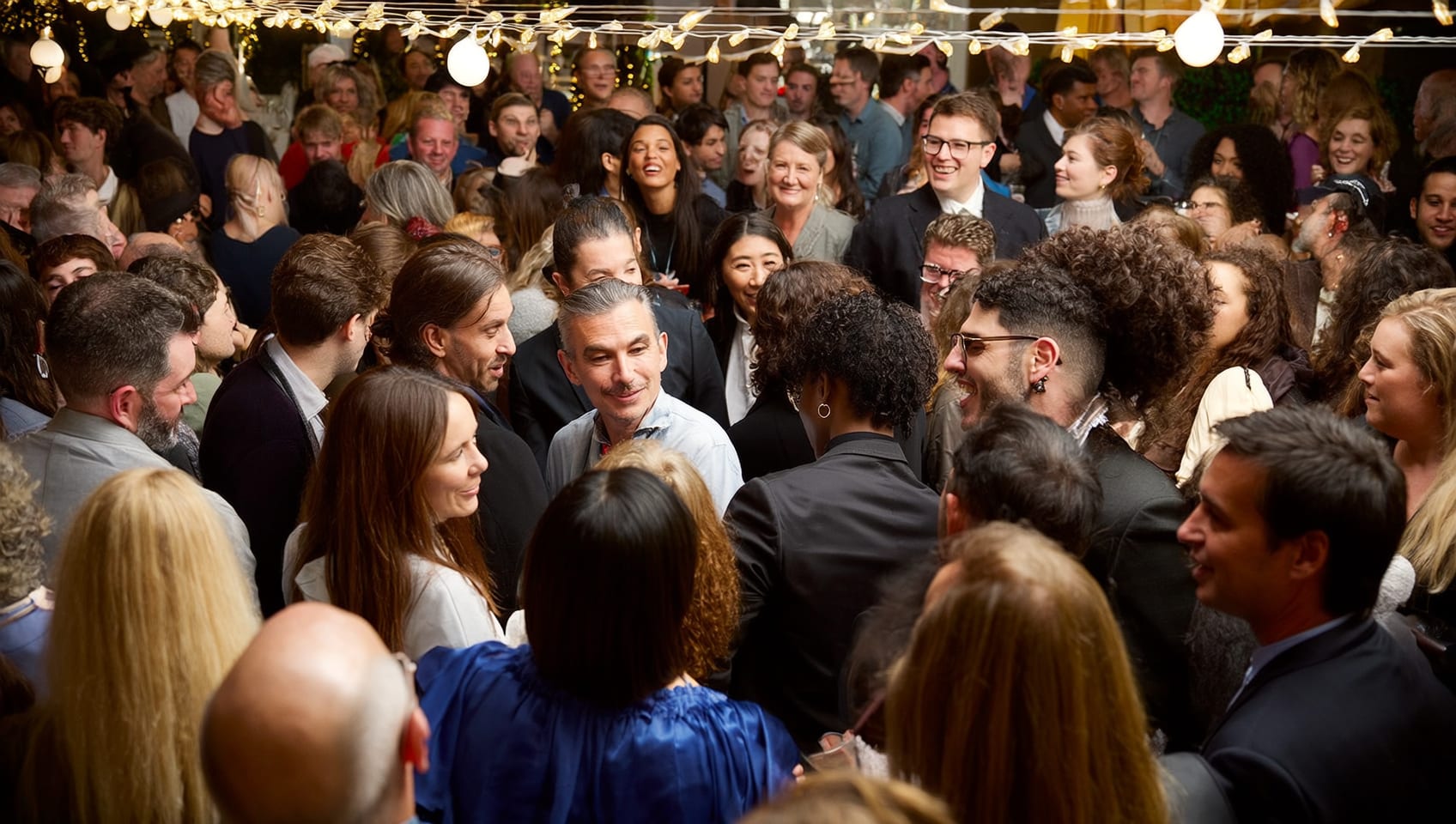 Guests celebrating together at a presale project launch event